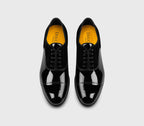 Black patent leather and velvet lace-up