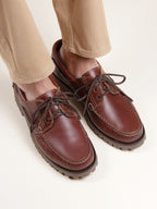 Brown lug-sole boat shoes